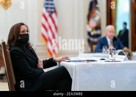 U.S President Joe Biden and Vice President Kamala Harris during a briefing on the economy in the State Dining Room of the White House January 22, 2021 in Washington, D.C. Stock Photo