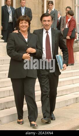 French health minister Philippe Douste-Blazy and his German Counterpart Ulla Schmidt arrive at the Elysee Palace in Paris Tuesday, April 26, 2005, before a joint meeting of the French and German cabinets to discuss economic cooperation and the European Union constitution as polls overwhelmingly show the French could reject the treaty. Photo by Giancarlo Gorassini/ABACA. Stock Photo