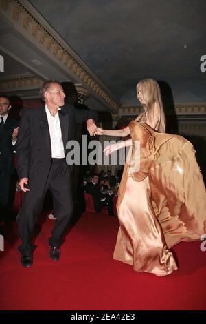 EXCLUSIVE. French TV man Patrick Poivre d'Arvor and Adriana Karembeu had a passionate dance during the 'Run For Life' party for the benefit of the Red Cross, organized by Cynthia Sarkis Perros and held at Majestic hotel in Cannes on May 14, 2005. Dress: Elie Saab, Jewels: Boucheron, Hairdress: Franck Provost, Make Up: Christian Dior. Photo by Nebinger-Hahn-Klein/ABACA. Stock Photo