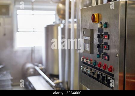 Background image of control panel with buttons and displays in workshop at production plant, copy space Stock Photo