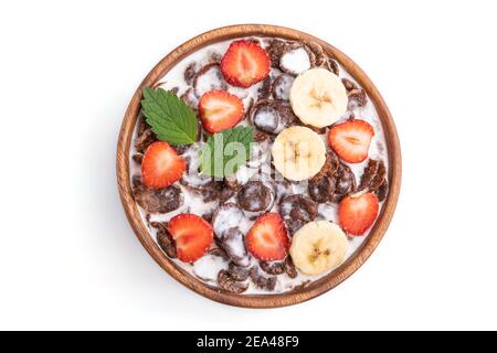Chocolate cornflakes with milk and strawberry in wooden bowl isolated on white background. Top view, flat lay, close up. Stock Photo