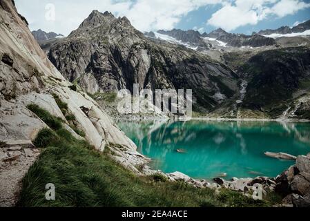 Beautiful mountain lake Gelmersee in Bern Switzerland Stock Photo