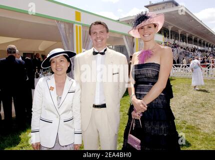 French president Jacques Chirac adopted daughter, Ahn Dao Traxel, her husband Emmanuel Traxel and former Miss France Sophie Thalmann attend the 157th Prix de Diane held on Chantilly racetrack near Paris, France on June 12, 2005. Photo by Bruno Klein/ABACA. Stock Photo