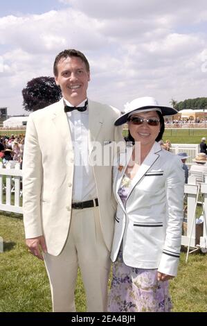 French president Jacques Chirac adopted daughter, Ahn Dao Traxel, and her husband Emmanuel Traxel attend the 157th Prix de Diane held on Chantilly racetrack near Paris, France on June 12, 2005. Photo by Bruno Klein/ABACA. Stock Photo