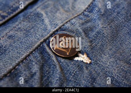 close up, macro shot of Lee of denim jeans jacket from 1946 Stock Photo