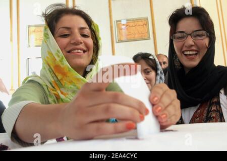 Iranian women cast their ballots in the Iranian presidential election in Tehran, Iran on Friday June 17, 2005. Photo by ABACA Stock Photo