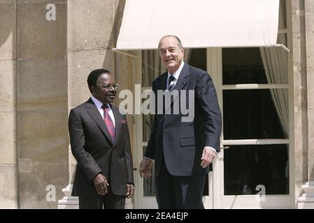 French President Jacques Chirac greets his Gabonese counterpart El Hadj Omar Bongo at the Elysee Palace, in Paris, on June 24, 2005. Photo by Mousse/ABACA Stock Photo
