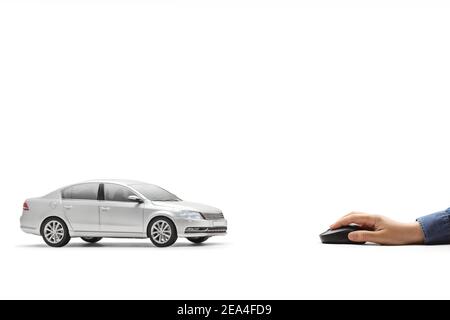 Hand clicking on a computer mouse and a silver car isolated on white background Stock Photo
