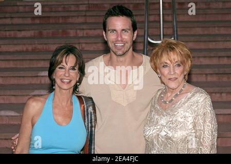 Cast members of 'The young and the restless', Jess Walton, Jeanne Copper pose with Cast member of 'Days of your lives', Brody Hutzler at the 'Canal+' party at the Monaco Beach Hotel, during the 45th Monte-Carlo Television Festival in Monaco, on June 29, 2005. Photo by Gerald Holubowicz/ABACAPRESS.COM Stock Photo
