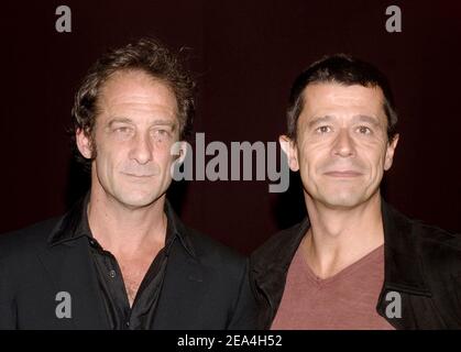 French director Emmanuel Carrere (R) and cast member Vincent Lindon pose at the premiere of 'La Moustache' held at Publicis Cinema in Paris, France on July 5, 2005. Photo by Giancarlo Gorassini/ABACAPRESS.COM. Stock Photo