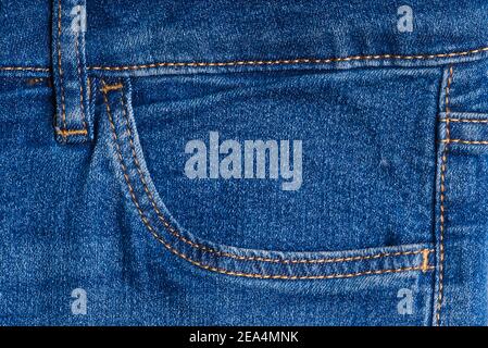 jeans pockets. blue jeans macro texture background. Stock Photo