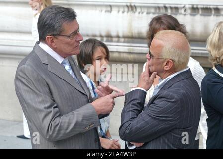 French producer Jean-Claude Camus and French singer Michel Fugain attend French actress Mimie Mathy and Benoist Gerard's wedding at the city hall of Neuilly-sur-Seine near Paris on August 27, 2005. Photo by Mehdi Taamallah/ABACAPRESS.COM Stock Photo