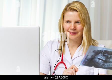 woman doctor in telehealth concept. Remote medical help for distance patient, telemedicine. Stock Photo