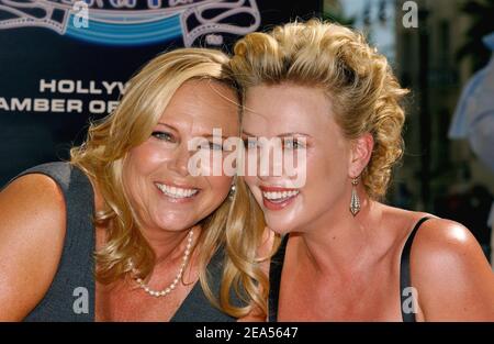 South-African born actress Charlize Theron poses with her mother Gerda Theron as she is honored with the 2291st star on the Hollywood Walk of Fame in front of the Kodak Theatre next to Nicole Kidman and Steven Spielberg, in Los Angeles, CA, USA, on September 29, 2005. Photo by Lionel Hahn/ABACAPRESS.COM. Stock Photo