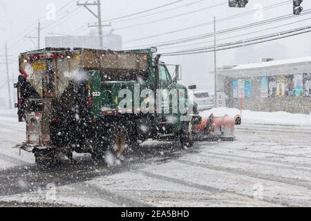 NORWALK, CT, USA -FEBRUARY 7, 2021:  Snow plow truck  during snow storm  day on Connecticut Ave. Stock Photo