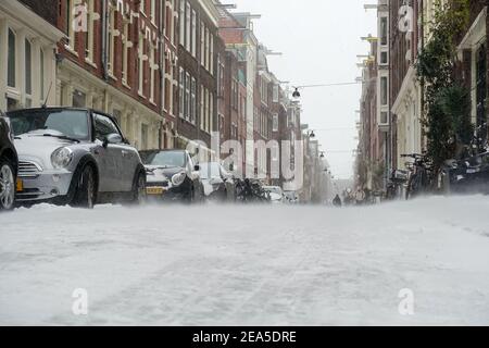 Amsterdam, The Netherlands, 7th February, 2021. The city centre brought to a standstill after massive snow storm Stock Photo