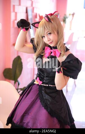 Japan anime cosplay , portrait of girl cosplay in pink room background Stock Photo