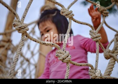 active, activity, adorable, adventure, asia, asian, baby, balance, beautiful, blur, brave, cable, cheerful, child, childhood, climbing, course, cute, Stock Photo