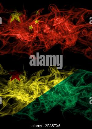 China, Chinese vs Brazil states Acre smoky mystic flags placed side by side. Thick colored silky abstract smoke flags. Stock Photo