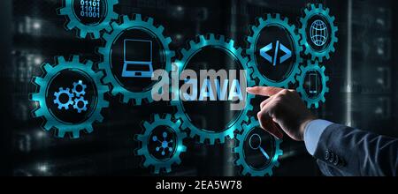 Business Man pushing on a touch screen interface Java Programming concept. Virtual machine Stock Photo