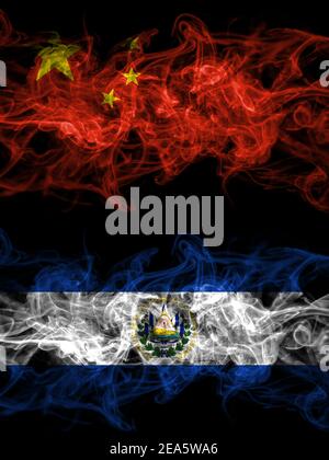 China, Chinese vs El Salvador, Salvadorian smoky mystic flags placed side by side. Thick colored silky abstract smoke flags. Stock Photo