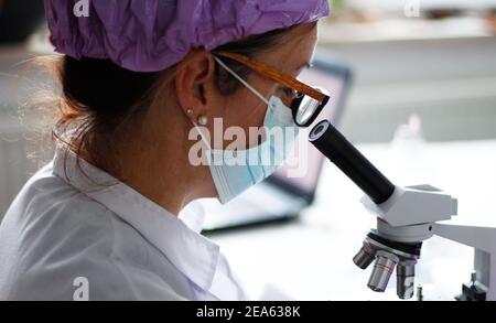Female Scientist carrying out Research in a Laboratory