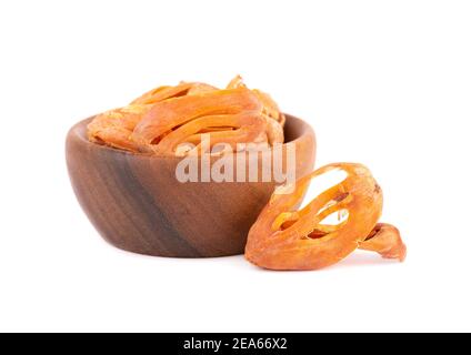 Mace in a wooden bowl, isolated on white background. Nutmeg flower, myristica fragrans. Natural spice, asian seasoning. Stock Photo