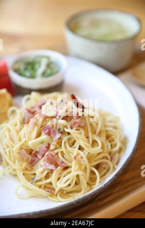Spaghetti with mussels and ham in japanese style Stock Photo