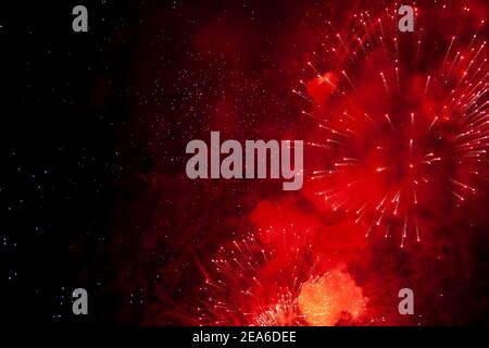 Celebrating fire work at night making people in country so happiness at night. Stock Photo