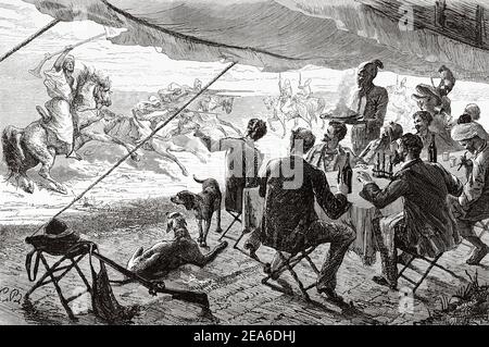 The Moroccan tradition of Fantasia. Lab al baroud. Uunpowder game or Tbourida, is a stylized reenactment of a wartime cavalry charge, a celebration of the region's history and of the bond between horse and rider. Morocco, North Africa. Old 19th century engraved illustration from El Mundo Ilustrado 1879 Stock Photo
