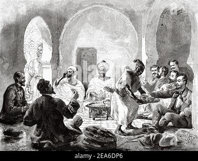 Meal of honor to the visitors in the house of Karia-el-Abbassi Governor of Tangier, Morocco, North Africa. Old 19th century engraved illustration from El Mundo Ilustrado 1879 Stock Photo