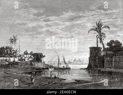 Roda Island (Gezīret er-Rōdah and Al Manyal ar-Rawdah) is an island located on the banks of the River Nile in central Cairo west of historic Old Cairo, along a small arm of the West Nile. Ancient Egypt History. Old 19th century engraved illustration from El Mundo Ilustrado 1879 Stock Photo