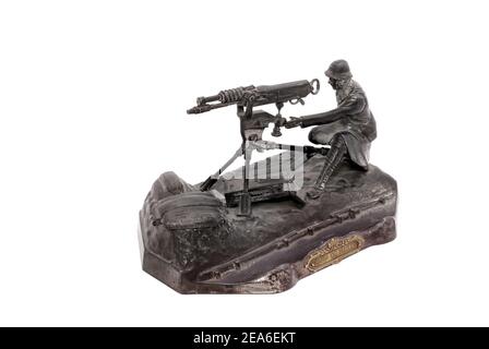 Vintage desk set (inkwell) in form of French machine gunner from period WW1. In memory of battle by Mailly. France. 1914-18. Stock Photo