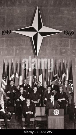 President Richard Nixon addressing audience at NATO's 20th anniversary meeting, State Department Interdepartmental Auditorium, Washington, D.C., USA. Stock Photo