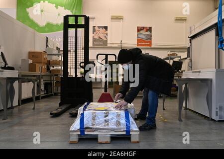 Prague, Czech Republic. 6th Feb, 2021. The first delivery of the vaccine against coronavirus from the AstraZeneca firm arrived in the dispatching centre of the Avenier company in Ricany near Prague, Czech Republic, on Saturday morning, February 6, 2021. Credit: Michal Kamaryt/CTK Photo/Alamy Live News Stock Photo