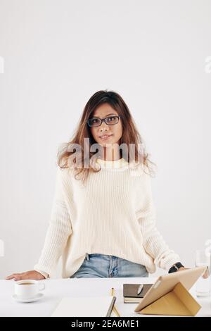 Woman studying from home Stock Photo