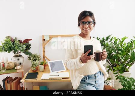 Pretty smiling fashionn designer Stock Photo