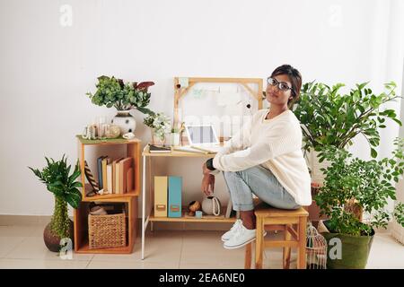 Young woman studying at home Stock Photo