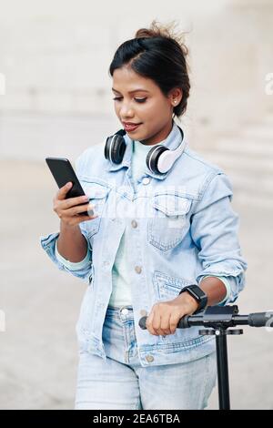 Woman reading text message Stock Photo