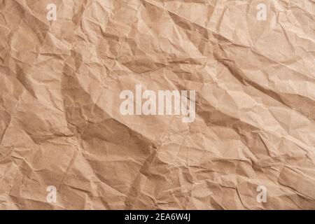 Abstract wrinkled wrinkled texture of wrapping brown paper. Abstract background Stock Photo