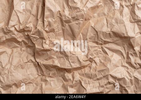 Textured surface of recycled packaging wrapping crumpled paper. Copy space. Empty blank Stock Photo