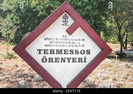12 September 2020, Termessos, Turkey: Signpost at the entrance to the national park of the ancient Greek city of Termessos Stock Photo