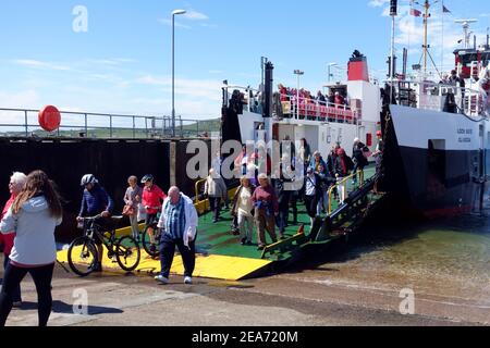 Passengers disembarking from Iona, on the Calmac Loch Buie ferry, at Fionnphort, Isle of Mull Stock Photo