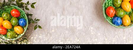 Banner for easter card. Flat lay composition with Easter eggs on white background. Stock Photo