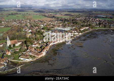 Aerial view of Bosham Village situated on an estuary, with the Church in the centre and pretty cottages at this popular sailing destination. Stock Photo