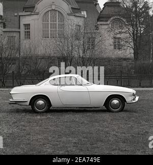 Volvo P1800. A sports car manufactured by Volvo Cars wtih production start 1961 and ending 1973. Styling was by swedish designer Pelle Pettersson. The car was indroduced at the Geneva Motor Show in 1961. The model P1800 sold 47492 cars.The P1800  became widely known when driven by then future James Bond actor Roger Moore as Simon Templar in the television series The Saint. Picture taken 1962. ref CV63-5 Stock Photo