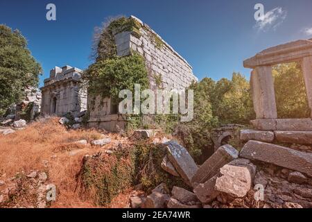 Ruins of a gymnasium and bath houses in the ancient city of Termessos in the Taurus Mountains in the region of ancient Pisidia. Archaeological sites o Stock Photo