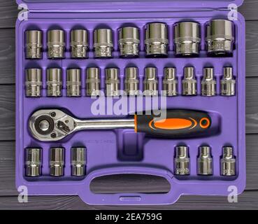 Chromium-vanadium steel. Purple case with spanners. Car repair tool. Stock Photo