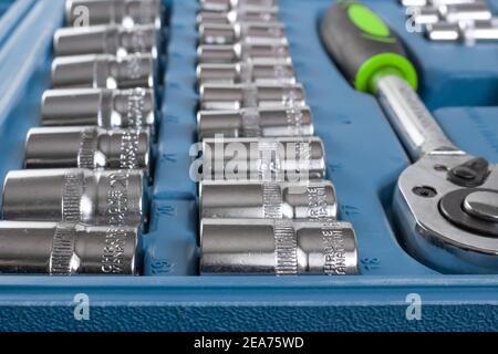 Background from wrenches. Set in a plastic case. Chromium-vanadium steel. Kyiv, Ukraine 08.02.2021 Stock Photo