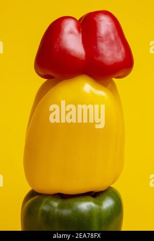 Studio food still life contrasted against a seamless dark yellow background. Stock Photo